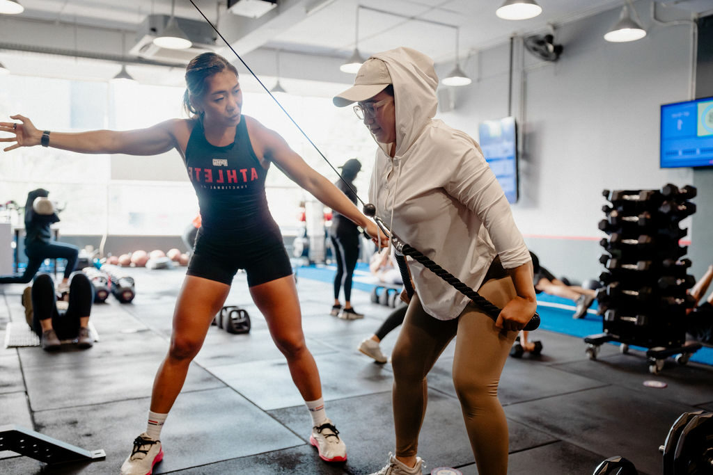 F45 coach leading a functional training class to demonstrate how F45 works for beginners and experienced members alike